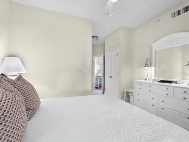 bedroom with visible vents and ceiling fan