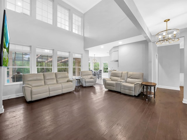 306 Marsh Point Cir, Saint Augustine, FL 32080 - living room with a chandelier, dark wood-type flooring, and a towering ceiling