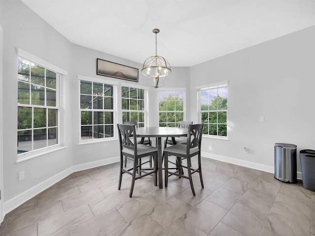 306 Marsh Point Cir, Saint Augustine, FL 32080 - dining space featuring a chandelier and baseboards