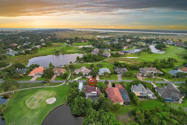 306 Marsh Point Cir, Saint Augustine, FL 32080 - aerial view of property and surrounding area featuring a large body of water, nearby suburban area, and a local golf course