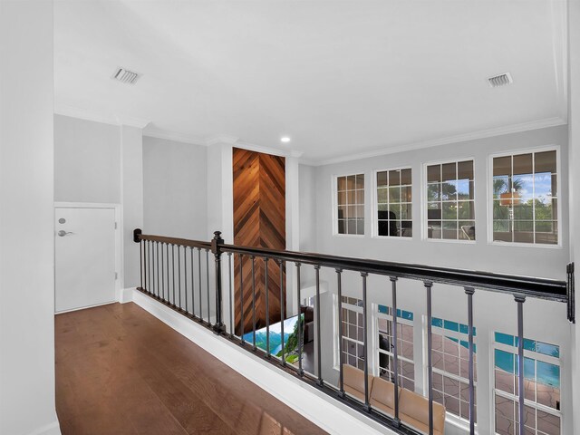 306 Marsh Point Cir, Saint Augustine, FL 32080 - hallway featuring crown molding, wood finished floors, an upstairs landing, and recessed lighting