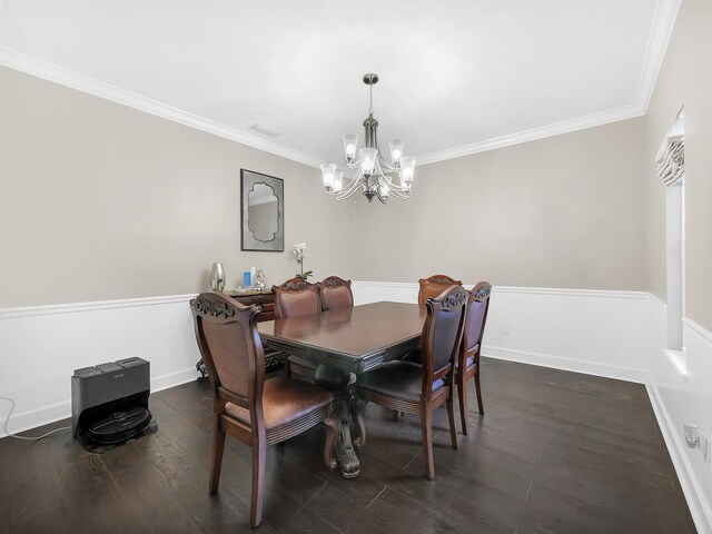 306 Marsh Point Cir, Saint Augustine, FL 32080 - dining space featuring a chandelier, ornamental molding, and dark wood finished floors