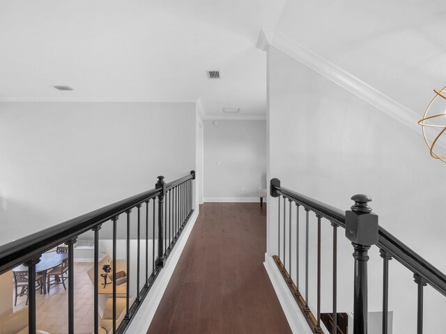 306 Marsh Point Cir, Saint Augustine, FL 32080 - corridor with an upstairs landing, ornamental molding, and wood finished floors