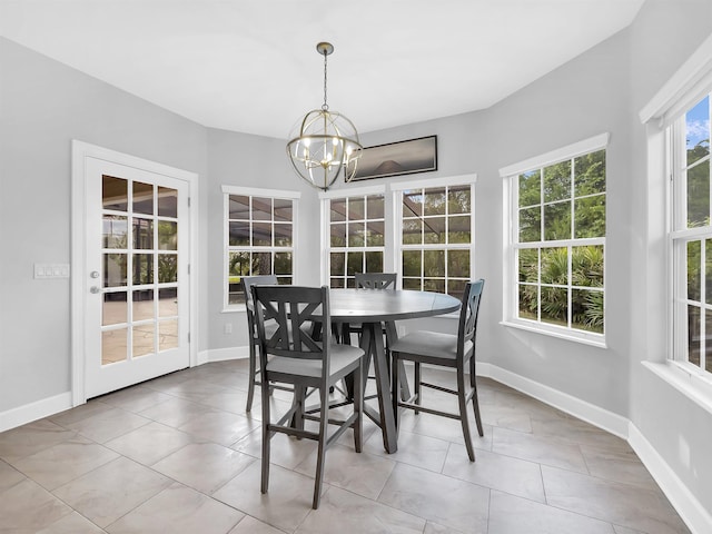 306 Marsh Point Cir, Saint Augustine, FL 32080 - dining room with a chandelier and tile patterned floors