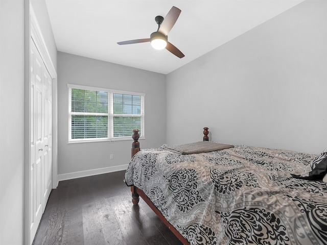 306 Marsh Point Cir, Saint Augustine, FL 32080 - bedroom with dark wood finished floors, a closet, and a ceiling fan