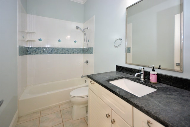 full bathroom with vanity, toilet, tiled shower / bath, and tile patterned flooring