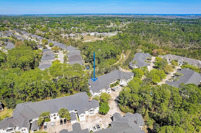 112 Laurel Wood Way Unit 202, Saint Augustine, FL 32086 - aerial overview of property's location with nearby suburban area and a heavily wooded area
