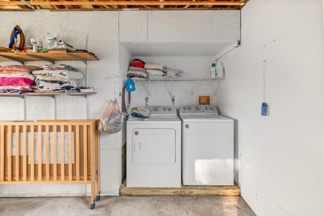 laundry room featuring laundry area and separate washer and dryer