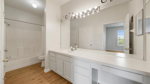 7990 Baymeadows Rd Unit 1114, Jacksonville, FL 32256 - bathroom with vanity, shower / bath combo, and wood finished floors