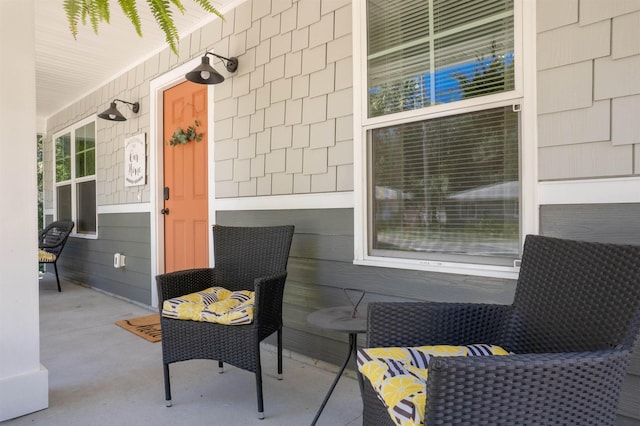 view of patio featuring a porch