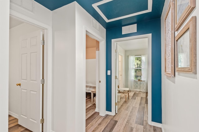 hall featuring light hardwood / wood-style floors