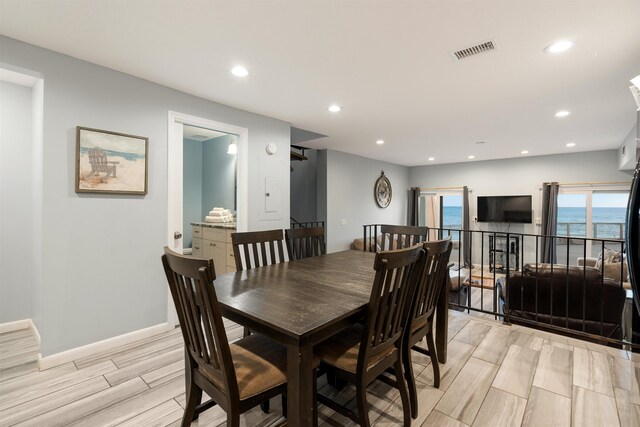 dining room featuring light wood-type flooring