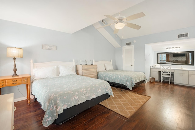 bedroom featuring vaulted ceiling, ceiling fan, dark wood-type flooring, and sink