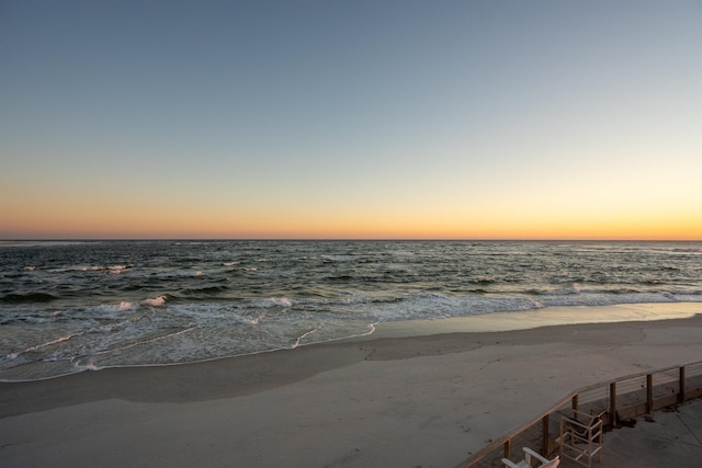 property view of water featuring a beach view