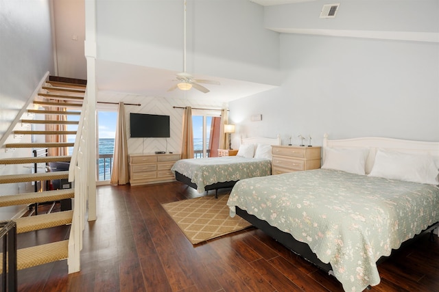 bedroom featuring ceiling fan, high vaulted ceiling, and dark hardwood / wood-style floors