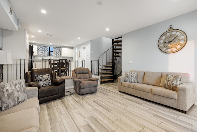 living room featuring light wood-type flooring