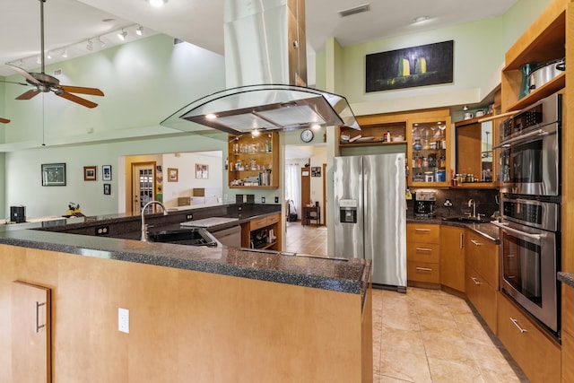 kitchen with visible vents, brown cabinetry, appliances with stainless steel finishes, island exhaust hood, and open shelves