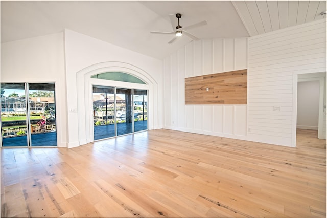 44 Cold Spring Ct, Palm Coast, FL 32137 - spare room featuring plenty of natural light, hardwood / wood-style flooring, a ceiling fan, and vaulted ceiling