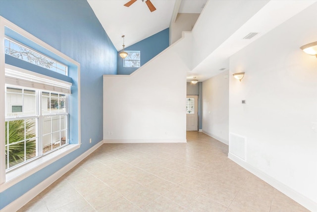 3330 Lewis Speedway, Saint Augustine, FL 32084 - spare room with baseboards, visible vents, tile patterned flooring, ceiling fan, and high vaulted ceiling