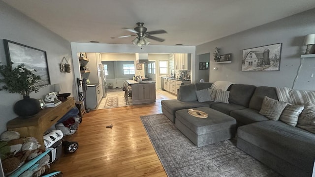 4208 Vermont Blvd, Elkton, FL 32033 - living area with ceiling fan and light wood-style flooring