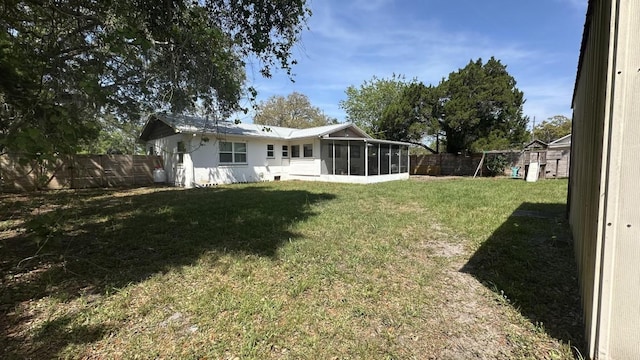 4208 Vermont Blvd, Elkton, FL 32033 - view of yard featuring a fenced backyard and a sunroom
