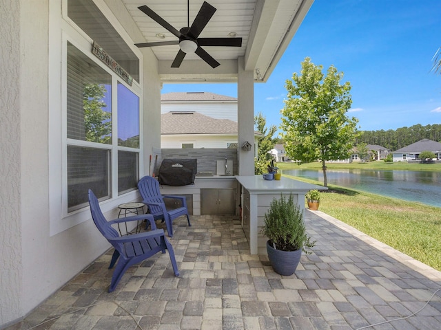 100 Coppinger Pl, Saint Johns, FL 32259 - view of patio / terrace featuring ceiling fan, an outdoor kitchen, and a water view