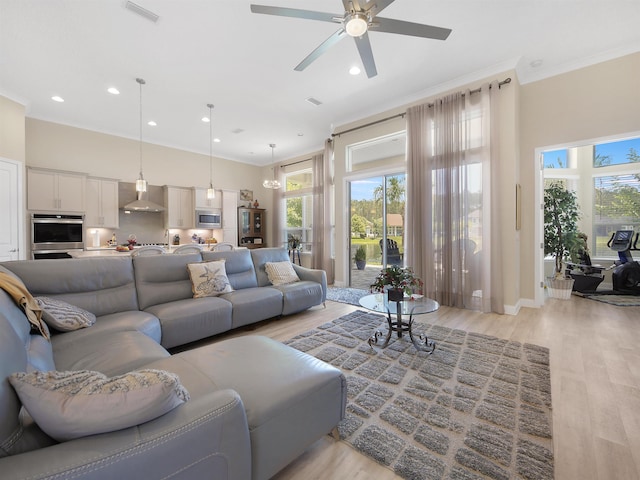 100 Coppinger Pl, Saint Johns, FL 32259 - living area with recessed lighting, ceiling fan, light wood-style flooring, and crown molding