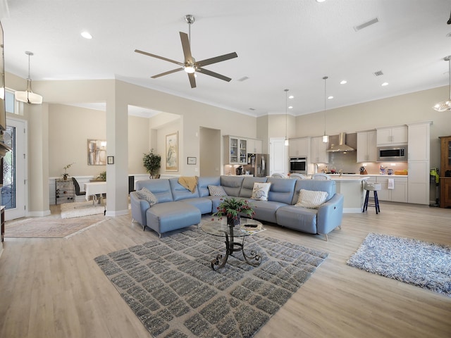 100 Coppinger Pl, Saint Johns, FL 32259 - living area with ornamental molding, light wood-type flooring, a ceiling fan, and recessed lighting