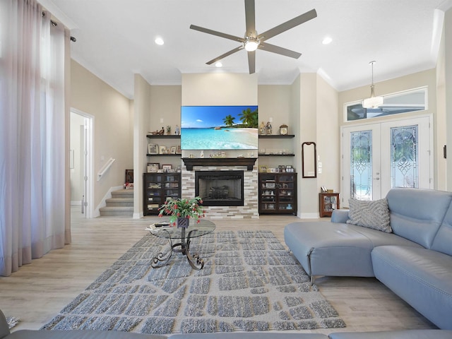 100 Coppinger Pl, Saint Johns, FL 32259 - living room featuring ornamental molding, wood finished floors, ceiling fan, a fireplace, and recessed lighting