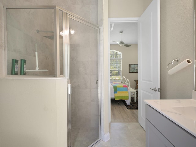 100 Coppinger Pl, Saint Johns, FL 32259 - full bath featuring connected bathroom, a ceiling fan, a shower stall, and vanity