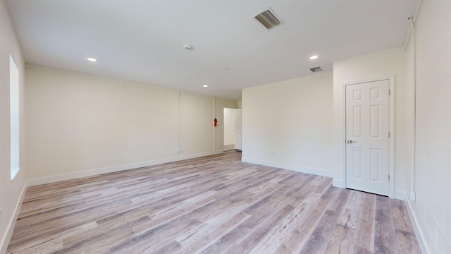 empty room with light wood-type flooring