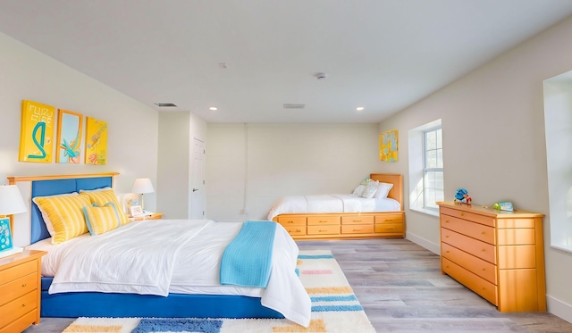 bedroom featuring light hardwood / wood-style flooring