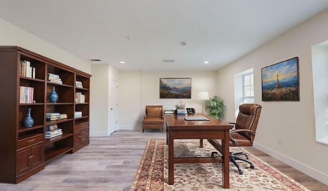 office area with light wood-type flooring