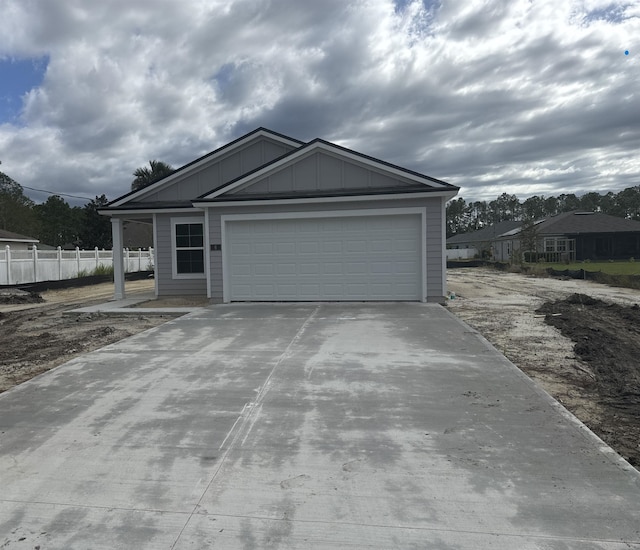 view of front of property with a garage