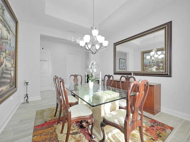 dining space with a notable chandelier