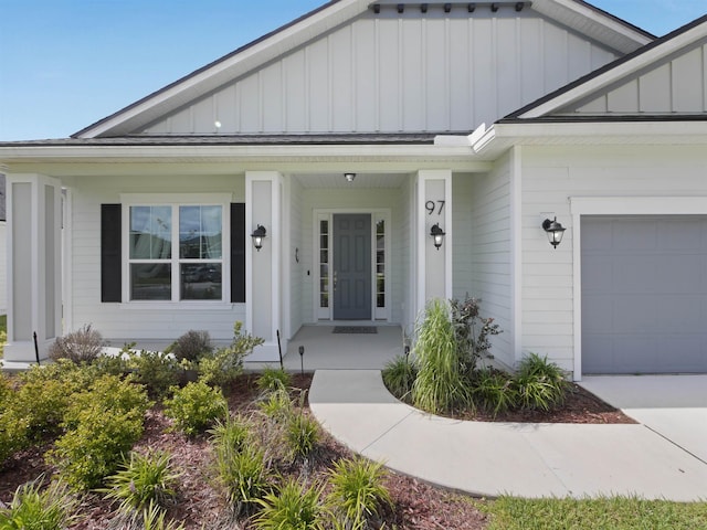 entrance to property featuring a garage