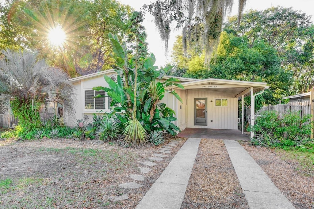 view of front of property featuring a carport