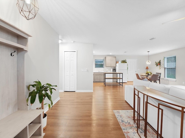 interior space with light hardwood / wood-style floors