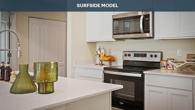 kitchen featuring white cabinets and stainless steel appliances