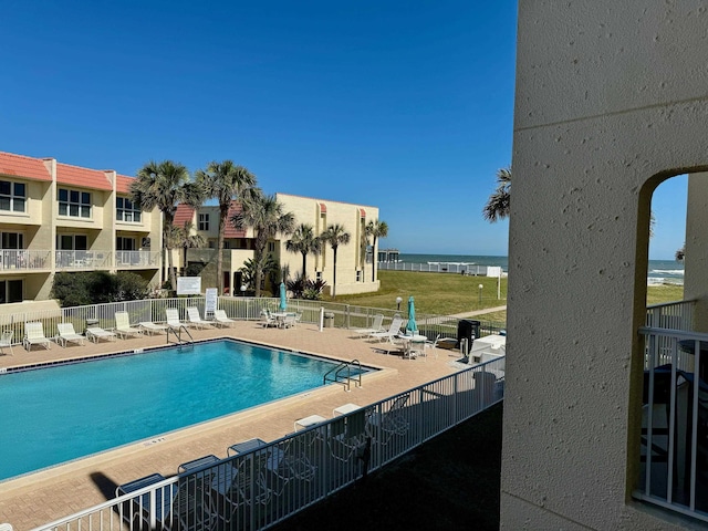 390 A1A Beach Blvd Unit 49, Saint Augustine Beach, FL 32080 - community pool with a patio and fence