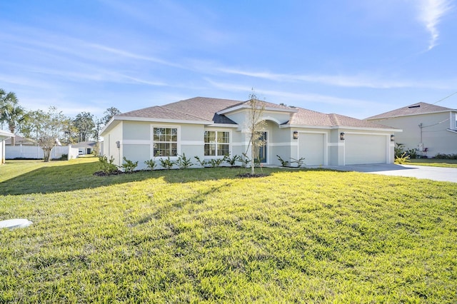 view of front facade with a front lawn and a garage