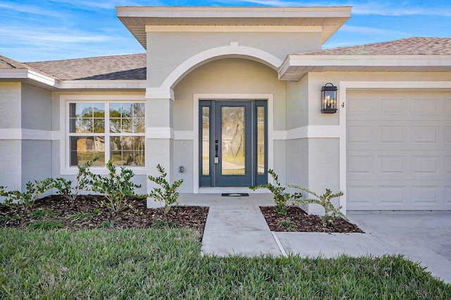 property entrance with a garage