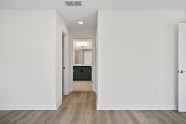 hall featuring light wood-type flooring