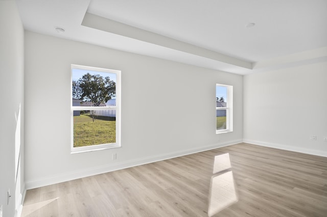 unfurnished room featuring light wood-type flooring