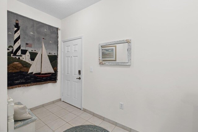 104 Laurel Wood Way Unit 202, Saint Augustine, FL 32086 - foyer entrance with light tile patterned floors