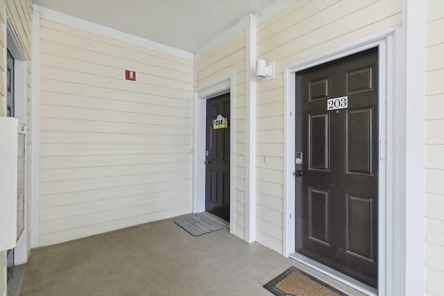 104 Laurel Wood Way Unit 202, Saint Augustine, FL 32086 - doorway to property featuring a porch