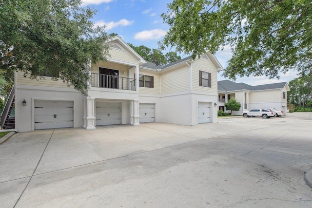 104 Laurel Wood Way Unit 202, Saint Augustine, FL 32086 - view of front of home with stucco siding and an attached garage