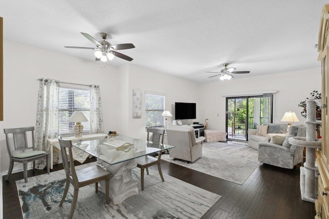 104 Laurel Wood Way Unit 202, Saint Augustine, FL 32086 - dining space featuring ceiling fan, dark wood-style floors, and a textured ceiling
