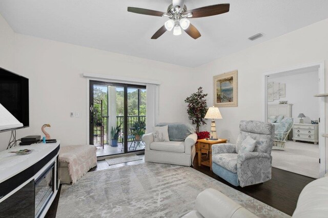 104 Laurel Wood Way Unit 202, Saint Augustine, FL 32086 - living room with wood finished floors and a ceiling fan