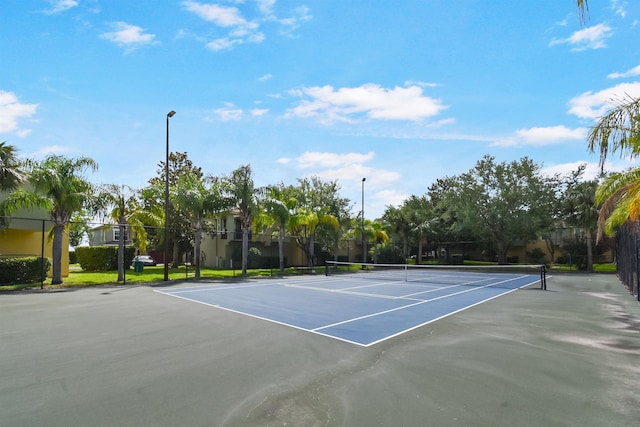 4020 Grande Vista Blvd Unit 204, Saint Augustine, FL 32084 - view of tennis court featuring community basketball court and fence